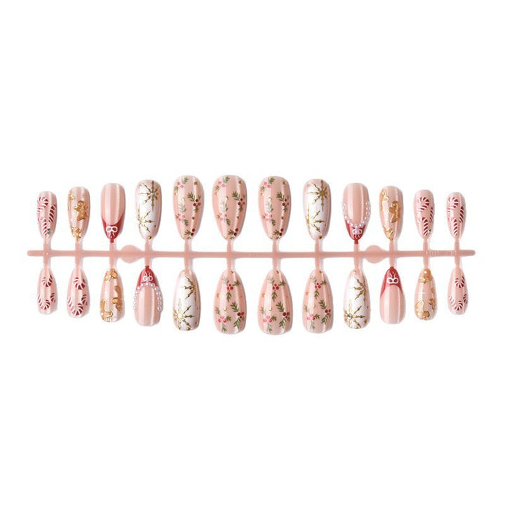 Artificial nail set with elegant Christmas motifs and glitter accents Stornfield