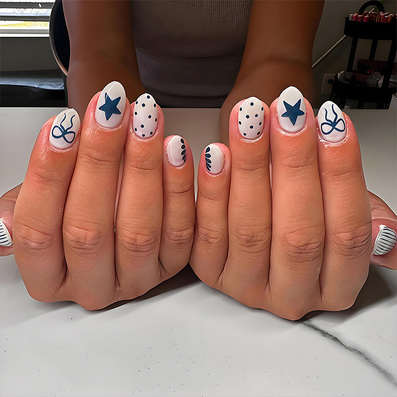 Nail art set with modern graphic patterns and stylish accents Stornfield