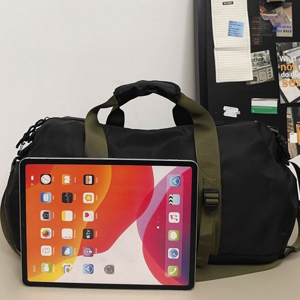 Sporty travel bag with adjustable shoulder strap and sturdy carrying handle Stornfield