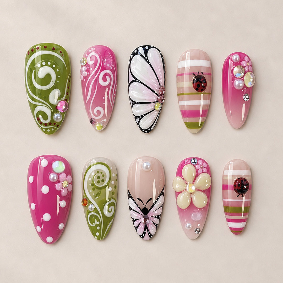Artificial nail set with playful floral and glitter motifs Stornfield