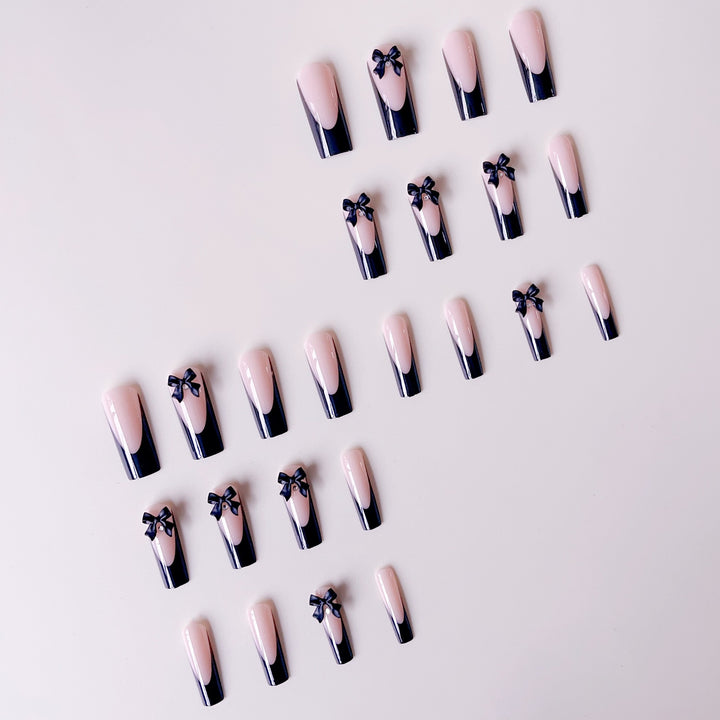 Elegant artificial nail tips with bow decorations Stornfield