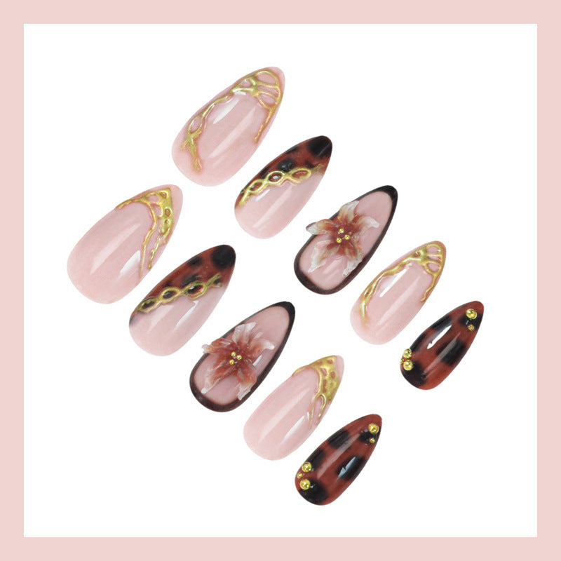 Artificial nail set with elegant floral accents and sparkling design Stornfield