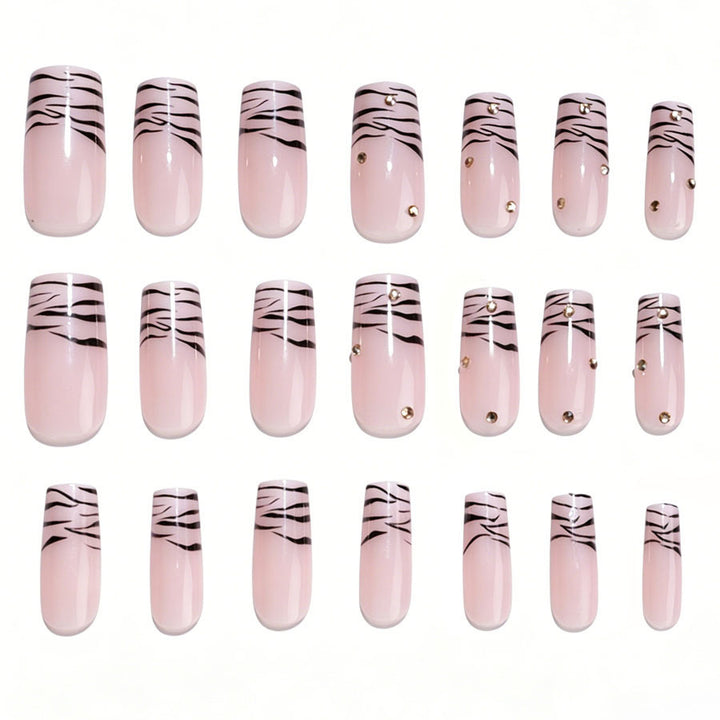 Art nail set with elegant lines and glitter accents Stornfield