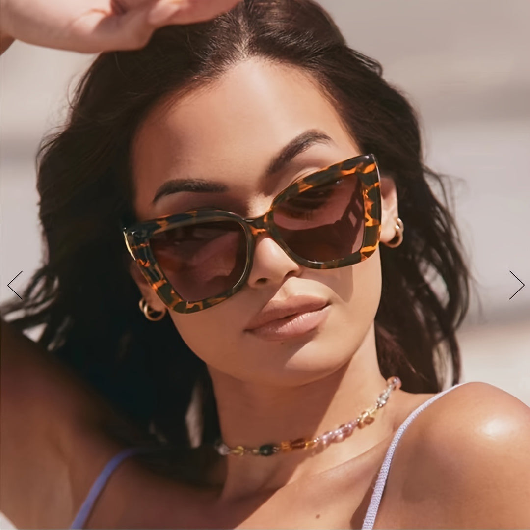 Ladies modern cat-eye sunglasses with clear frame and UV protection Stornfield