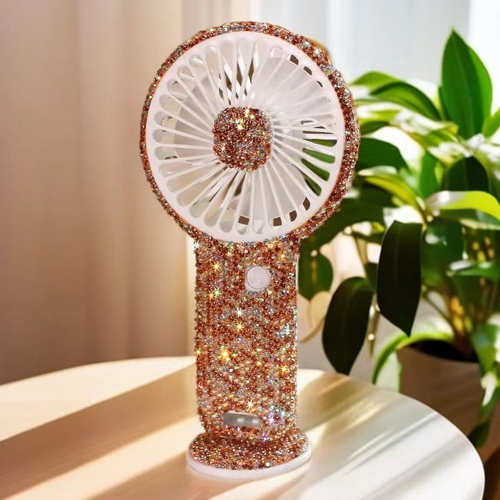 Women's portable hand fan rechargeable with rhinestone accents and cat emblem Stornfield