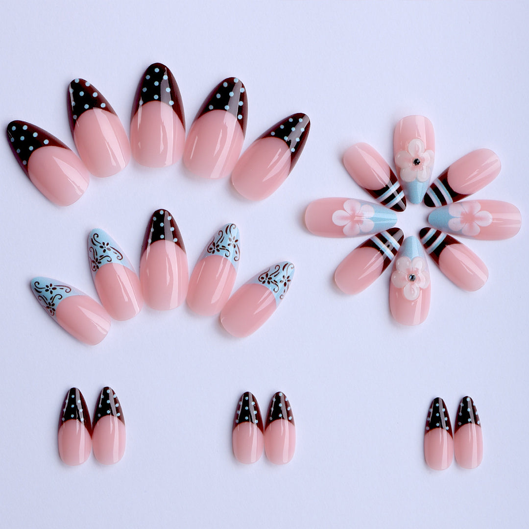 Artificial nails with creative floral design and elegant accent colors Stornfield