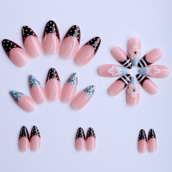 Artificial nails with creative floral design and elegant accent colors Stornfield