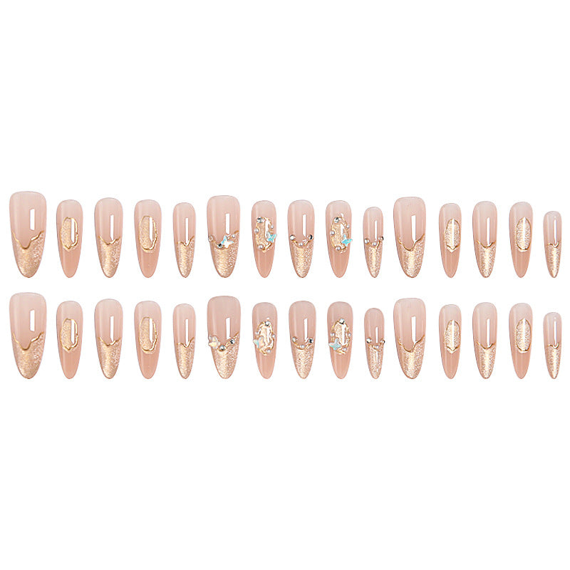 Art nail set with elegant gold glitter design Stornfield
