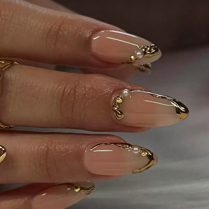 Elegant Gold-Decorated Acrylic Nail Art Enhancements Stornfield