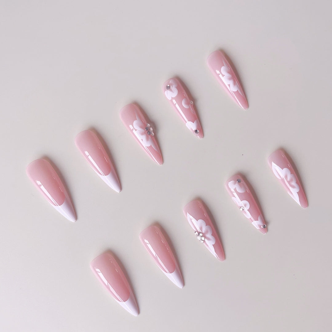 Elegant artificial nail set with floral design and glitter accents Stornfield