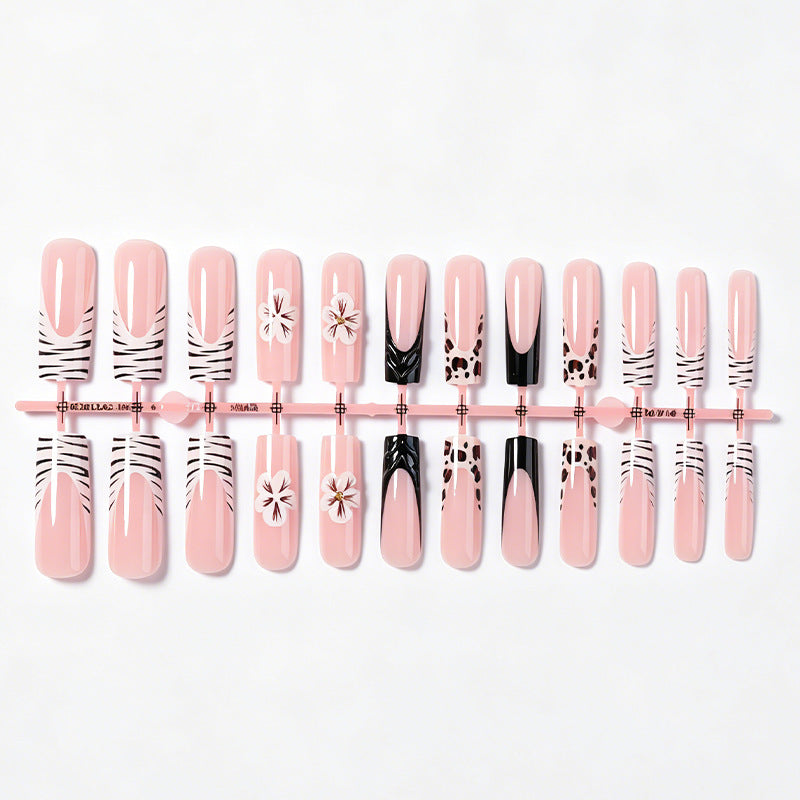 Artificial nail set with extravagant flower and animal designs Stornfield