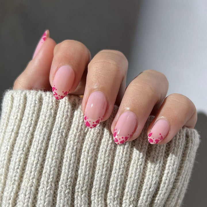 Artificial nail extensions with heart tip accents Stornfield