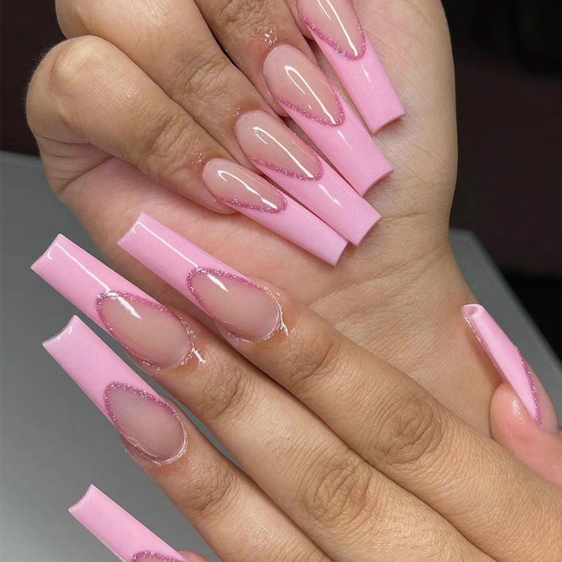 Artificial nail extensions with glitter decoration Stornfield