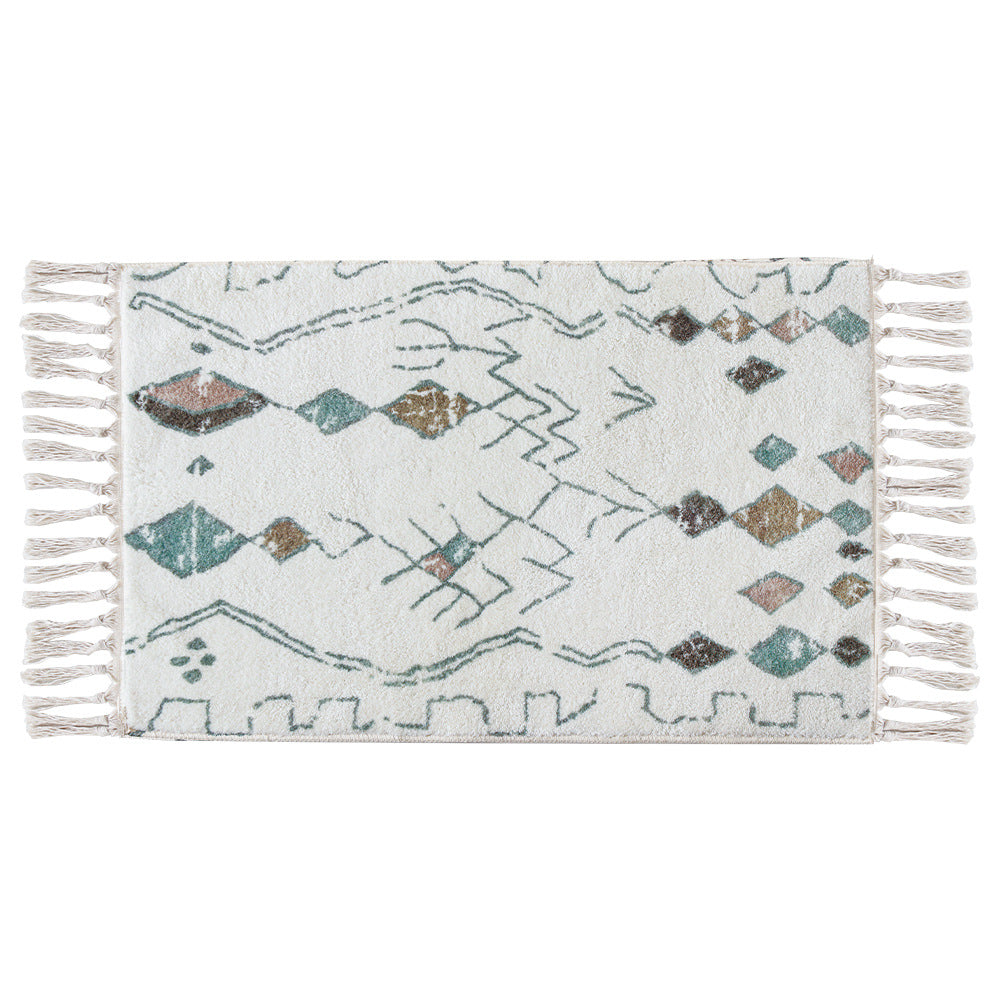 Boho cotton bath mat with fringes and geometric diamond pattern Stornfield