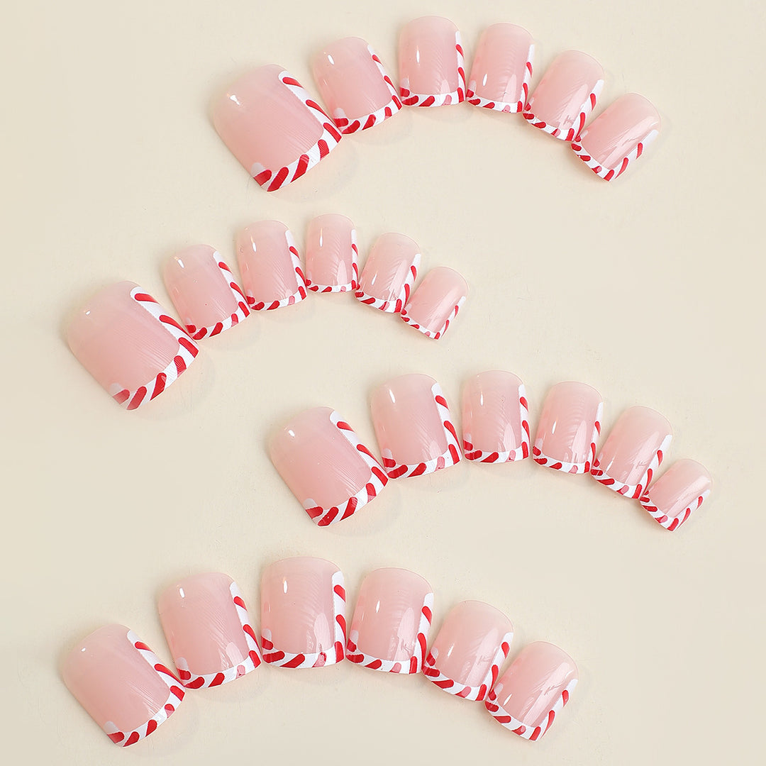 Creative nail art set with festive candy cane design Stornfield