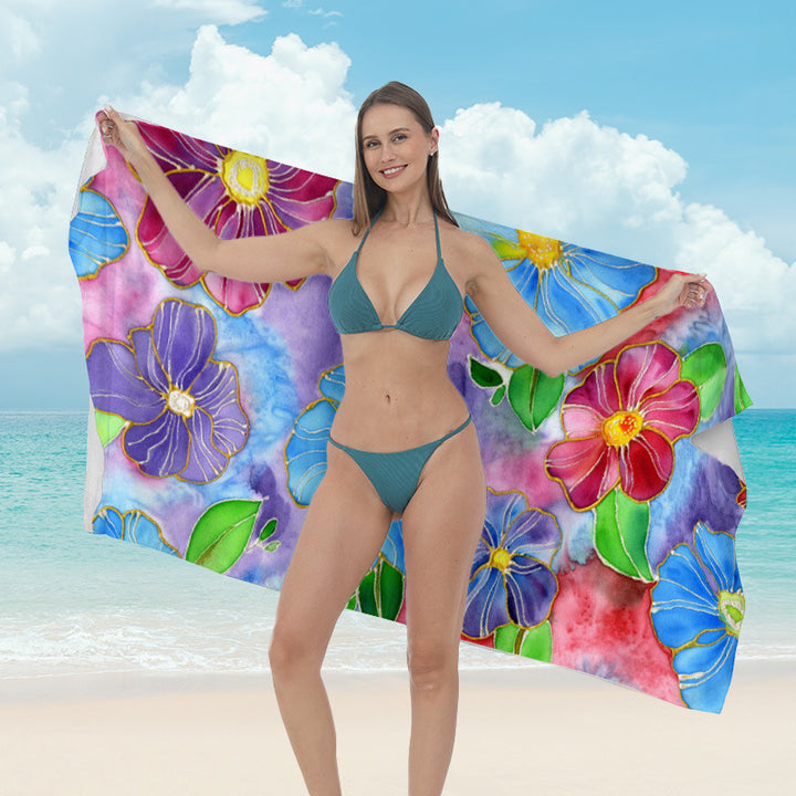 Beach towel with vibrant tropical plant motif Stornfield