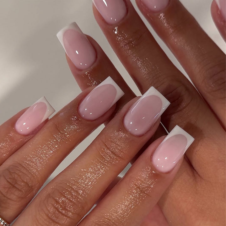 Artificial nail extensions with modern French tip Stornfield