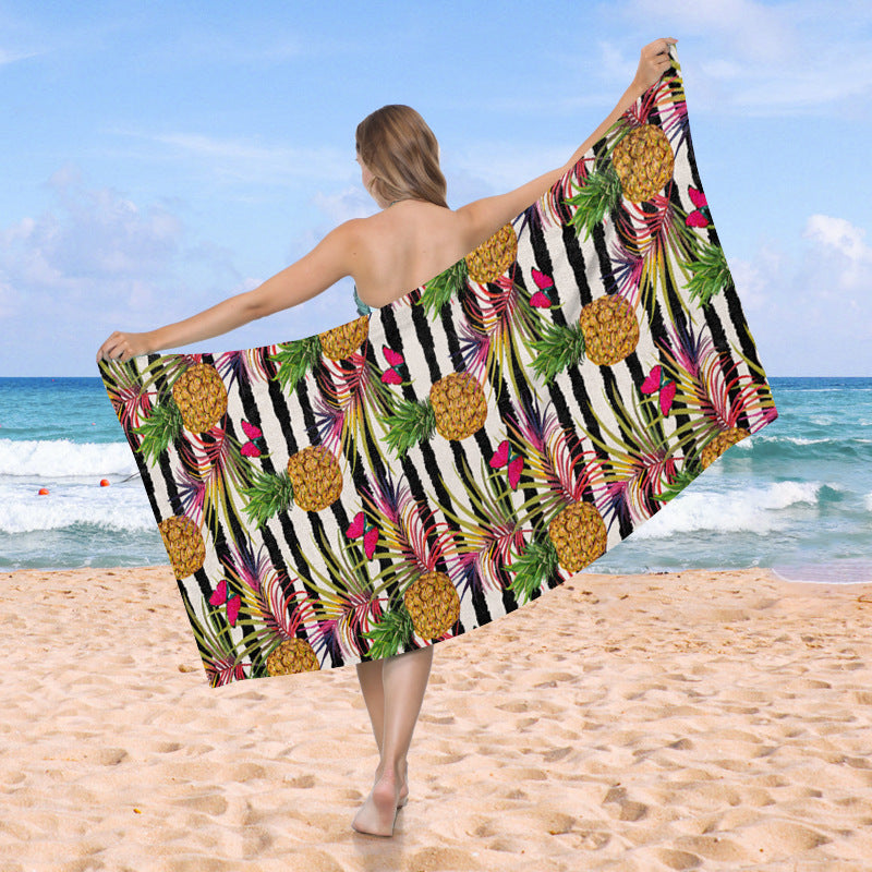 Beach towel with exotic pineapple and palm pattern Stornfield