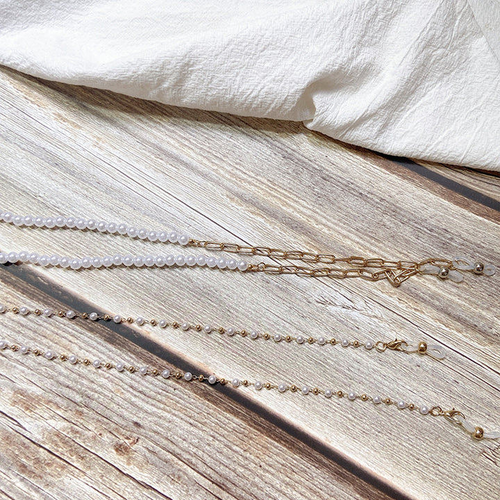 Pearl jewelry chain with golden link chain Stornfield
