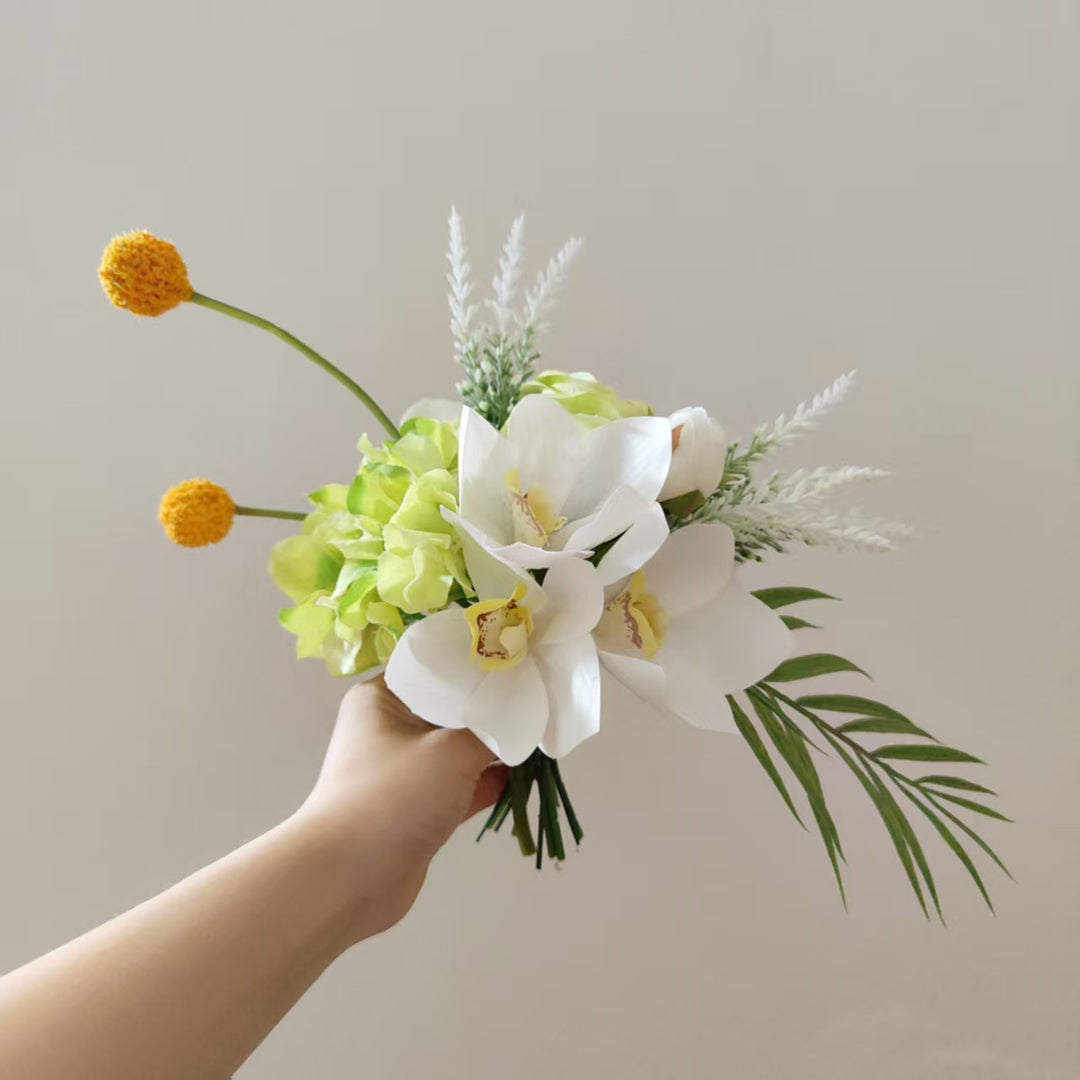 Lifelike Floral Arrangement with Orchids and Greenery