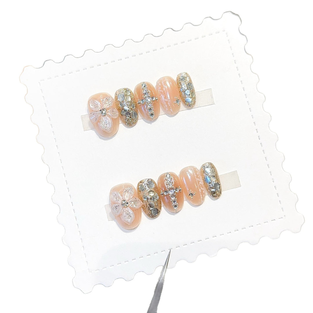 Glamorous artificial nails with floral and glittering accents Stornfield