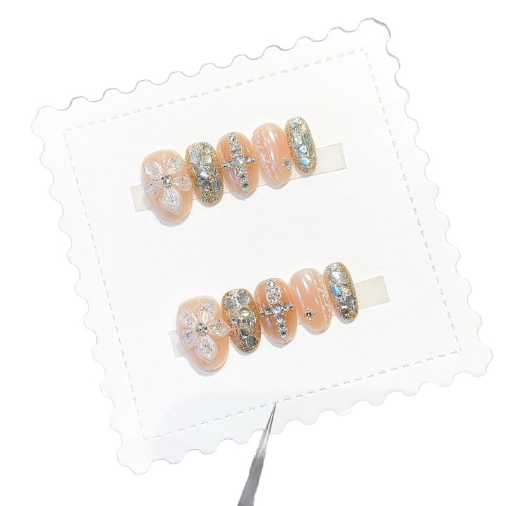 Glamorous artificial nails with floral and glittering accents Stornfield