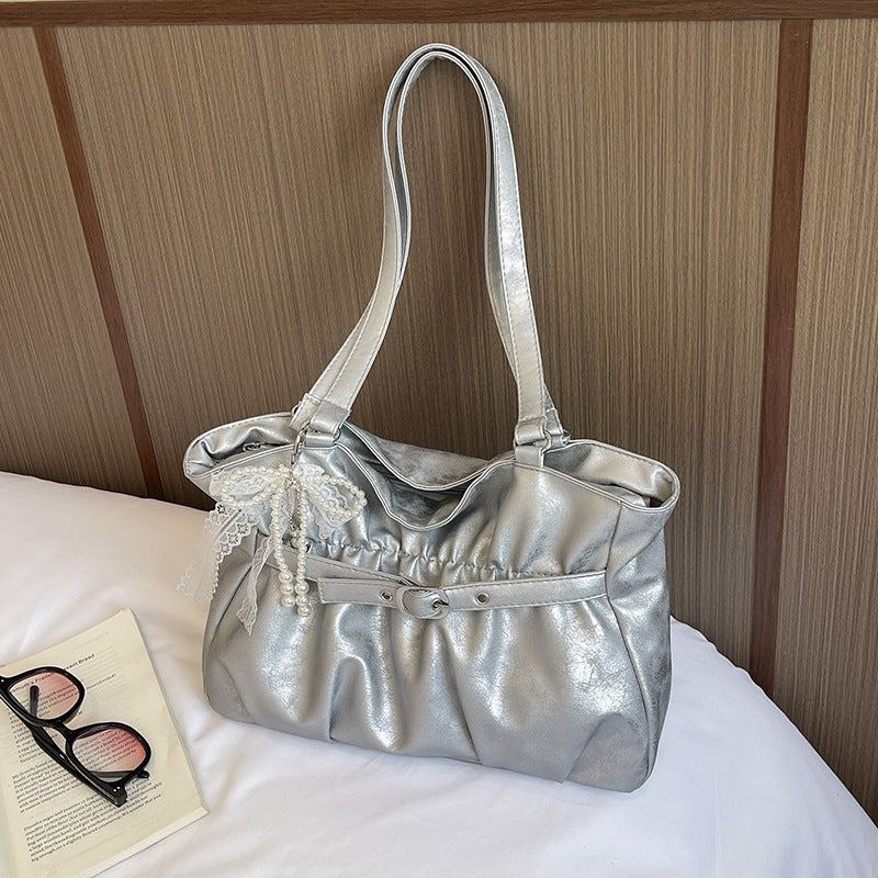 Elegant Leather Tote Bag with Decorative Accents