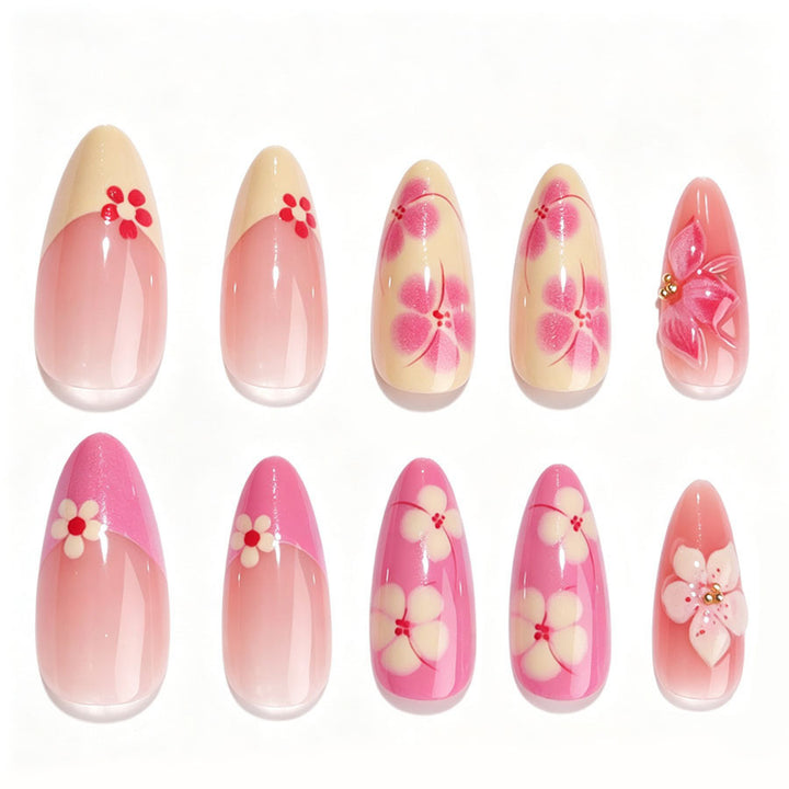 Artificial nail set with floral accents and glitter elements Stornfield