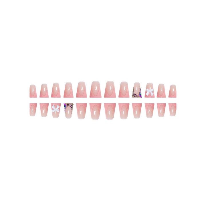 Decorative Acrylic Nail Enhancements with Bow and Rhinestone Accents Stornfield