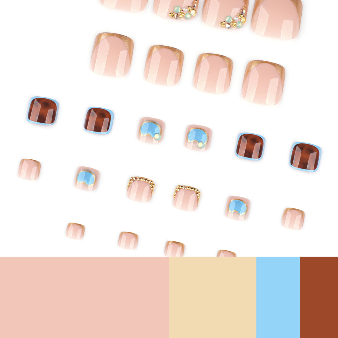Artistic toenail art with elegant gold design Stornfield