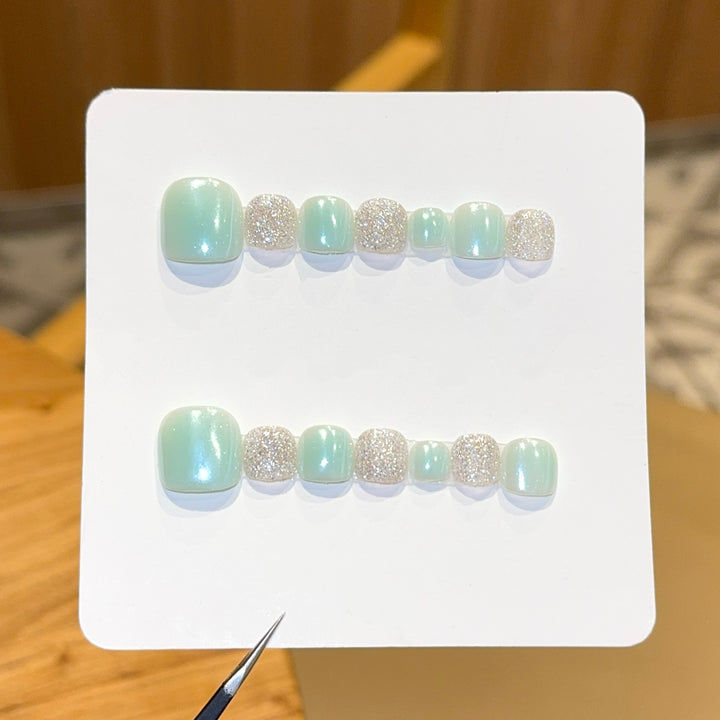 Acrylic nail set with glitter and pastel accent Stornfield