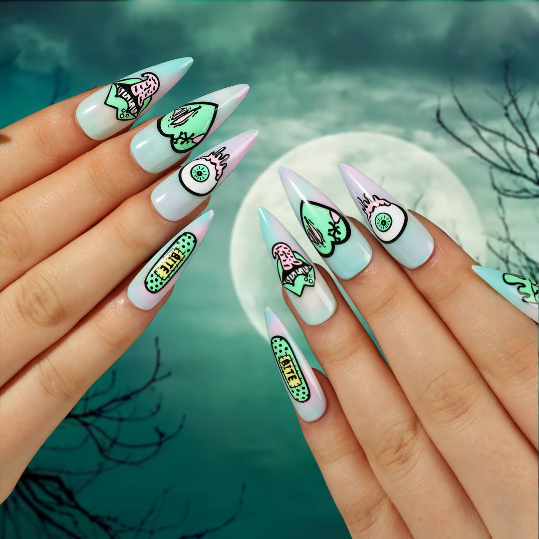 Artistic stiletto nails with creative designs and intricate detailing Stornfield