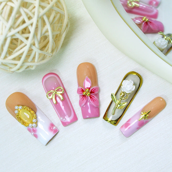 Artificial nail set with luxurious floral and glamorous decorations Stornfield