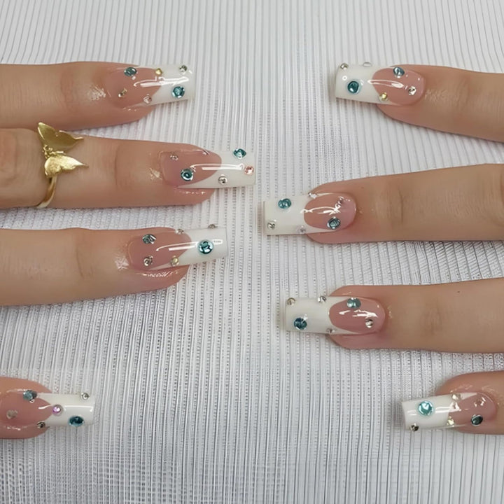 Artificial nail set with sparkling rhinestone accents and elegant details Stornfield