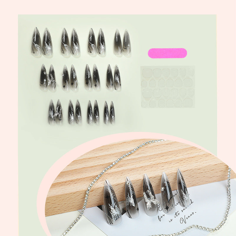 Artificial nail set with elegant floral design and sparkling accents Stornfield