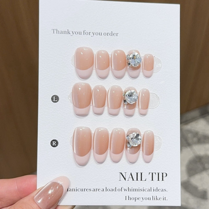 Artificial nail tips with elegant rhinestone accents Stornfield