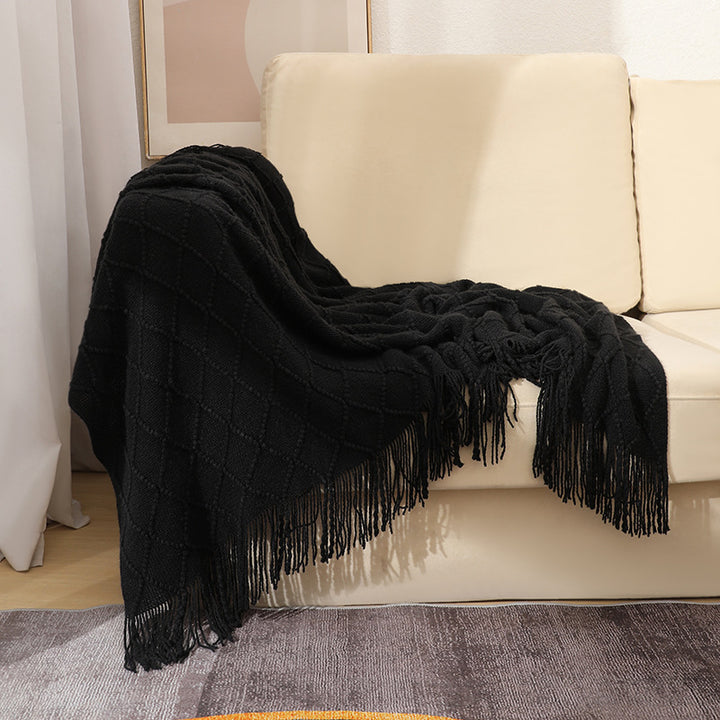 Women’s knitted blanket with textured wave pattern Stornfield