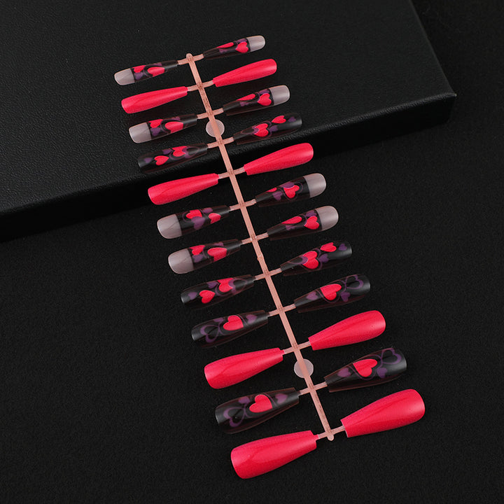 Fake nails in an eye-catching heart design Stornfield