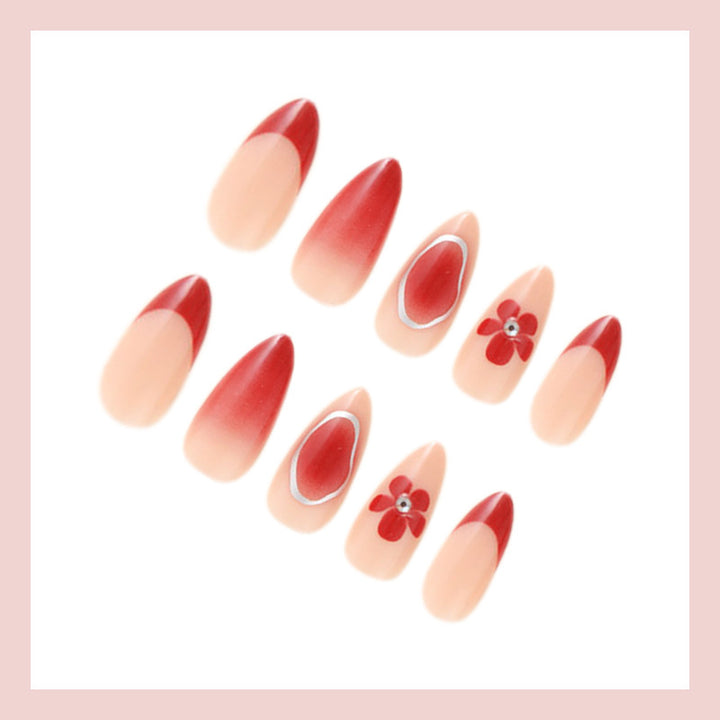 Artificial nail set with elegant flower and ombre accents Stornfield