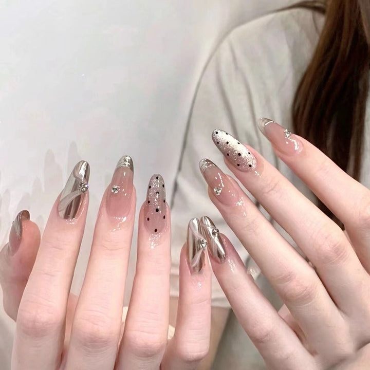 Artistic Stiletto Press-On Nail Set with Unique Design Elements Stornfield