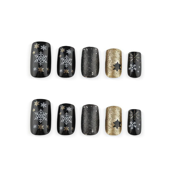 Creative artificial nails with sparkling glitter and festive winter design Stornfield
