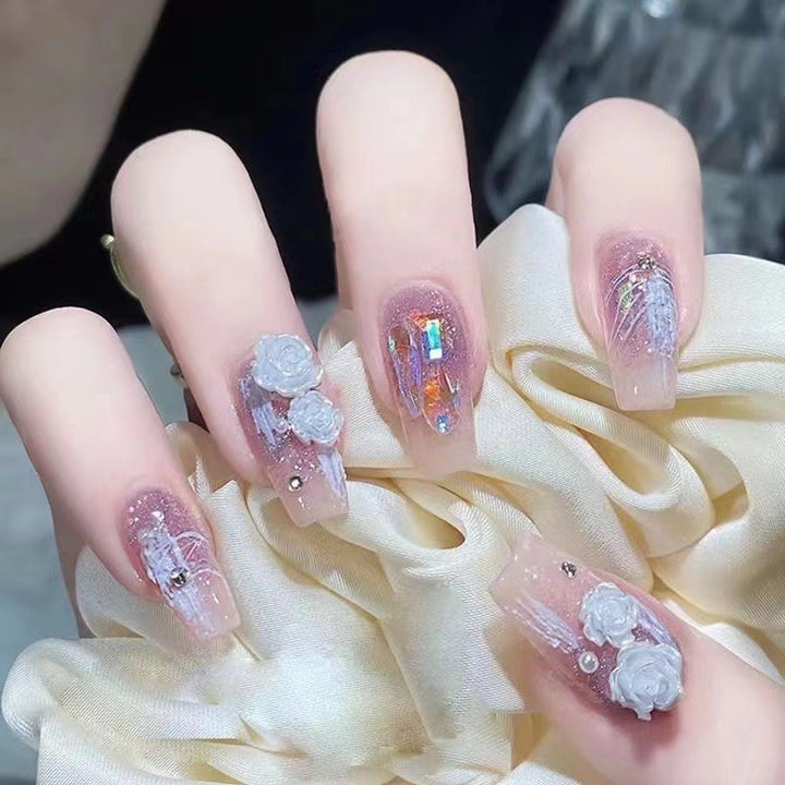Artistic nail art with floral embellishments Stornfield