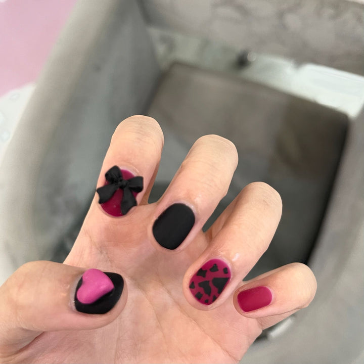 Artful nail extensions with an elegant leaf pattern Stornfield