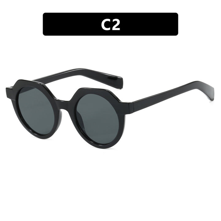Ladies extravagant round sunglasses with colored accented frame Stornfield