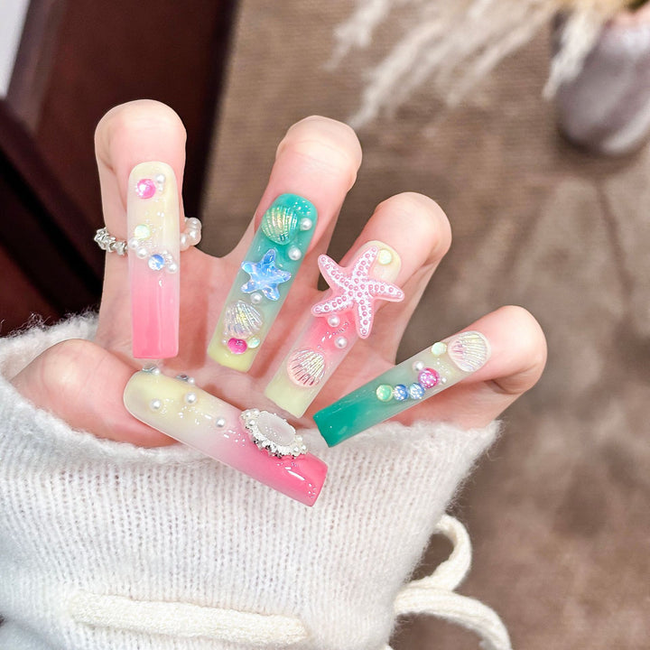 Artistic Long Press-On Nail Set with Ocean-Themed Design