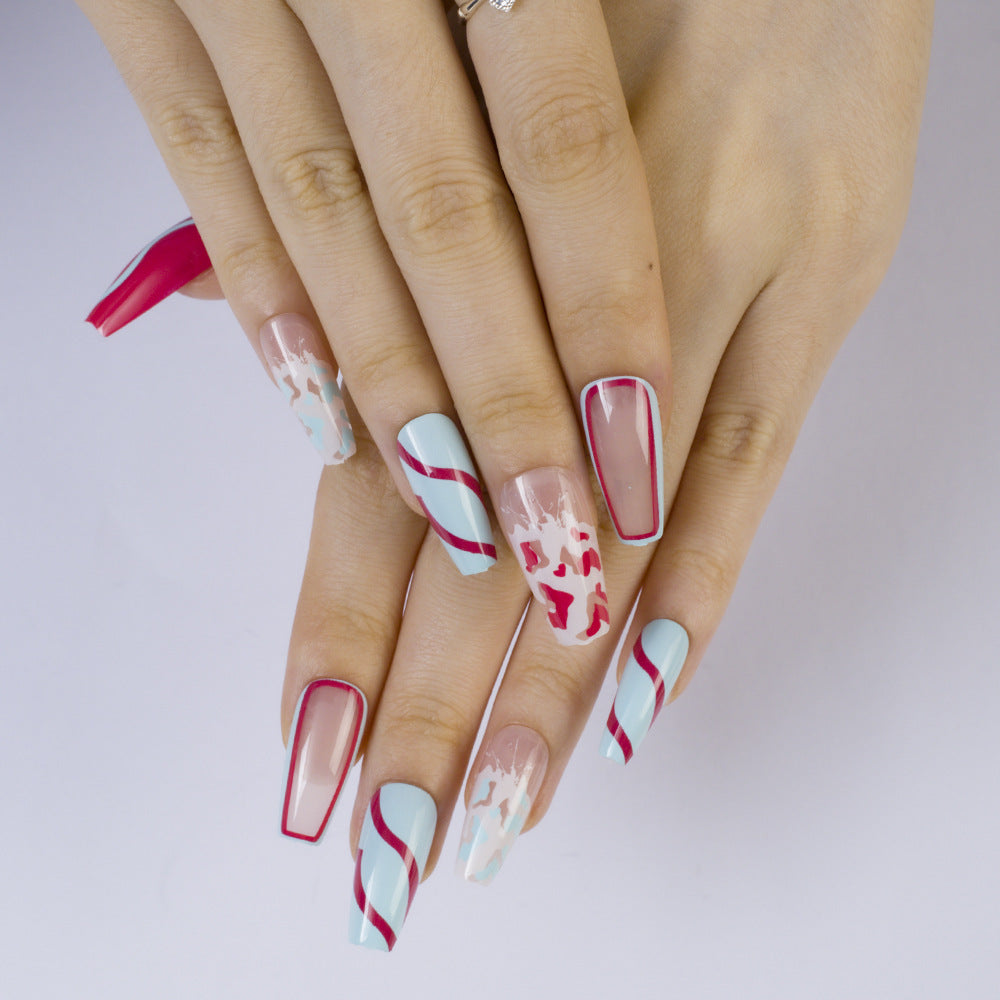 Artificial nails with modern wave pattern and heart accents Stornfield