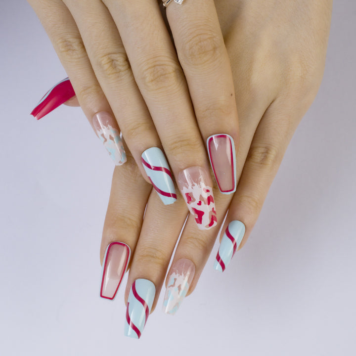 Artificial nails with modern wave pattern and heart accents Stornfield