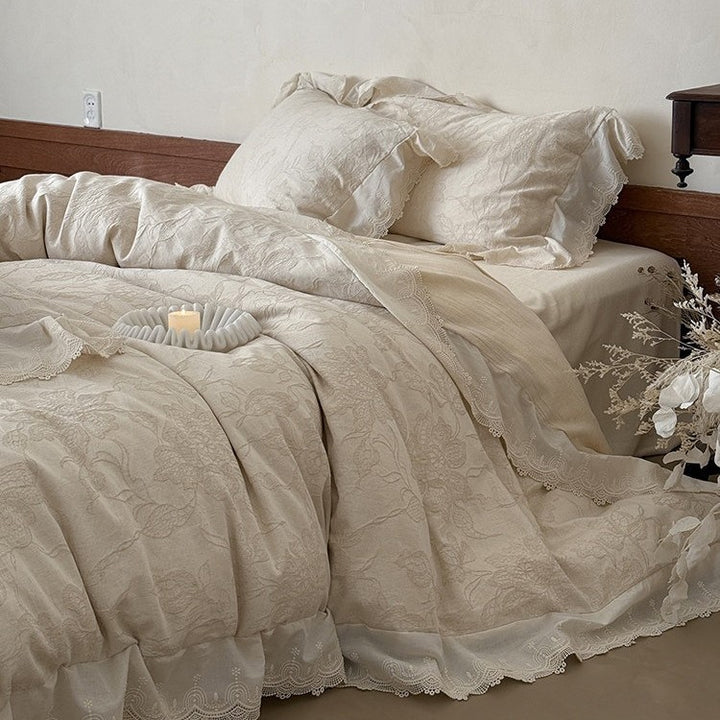 Jacquard bedding set with floral relief pattern and lace border