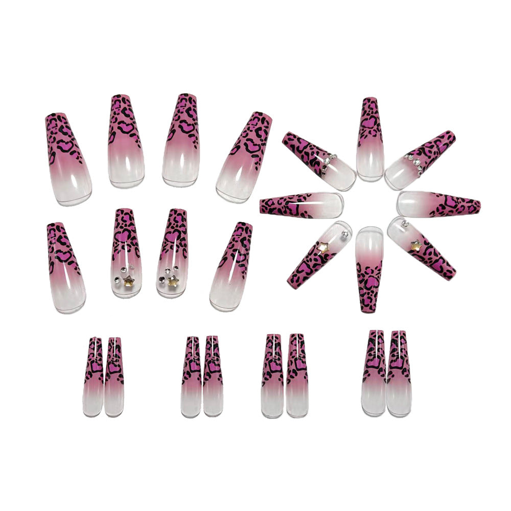 Artificial nails with leopard pattern and rhinestone details Stornfield