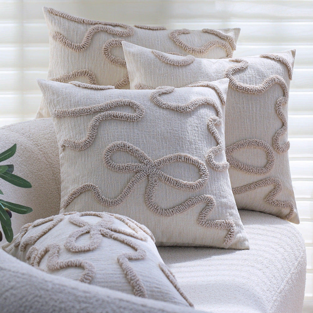 Square decorative cushion cover with hand-tufted bow and wave relief made of cotton-linen mix Stornfield